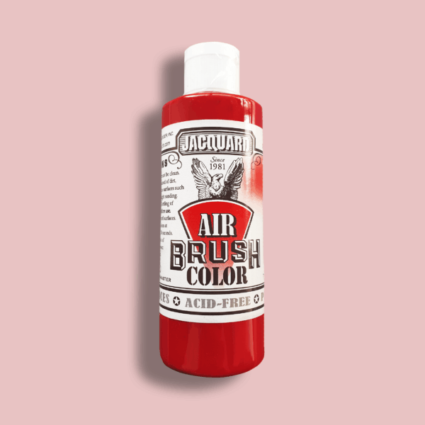 langwerpige fles met wit etiket met daarop een arend en in zwart met witte letters de tekst air brush color JAB2101 transparent red