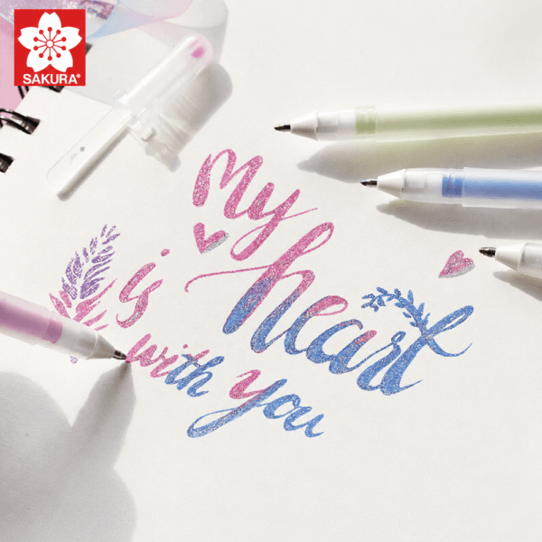 Sakura Gelly Roll Stardust handlettering voorbeeld op wit papier